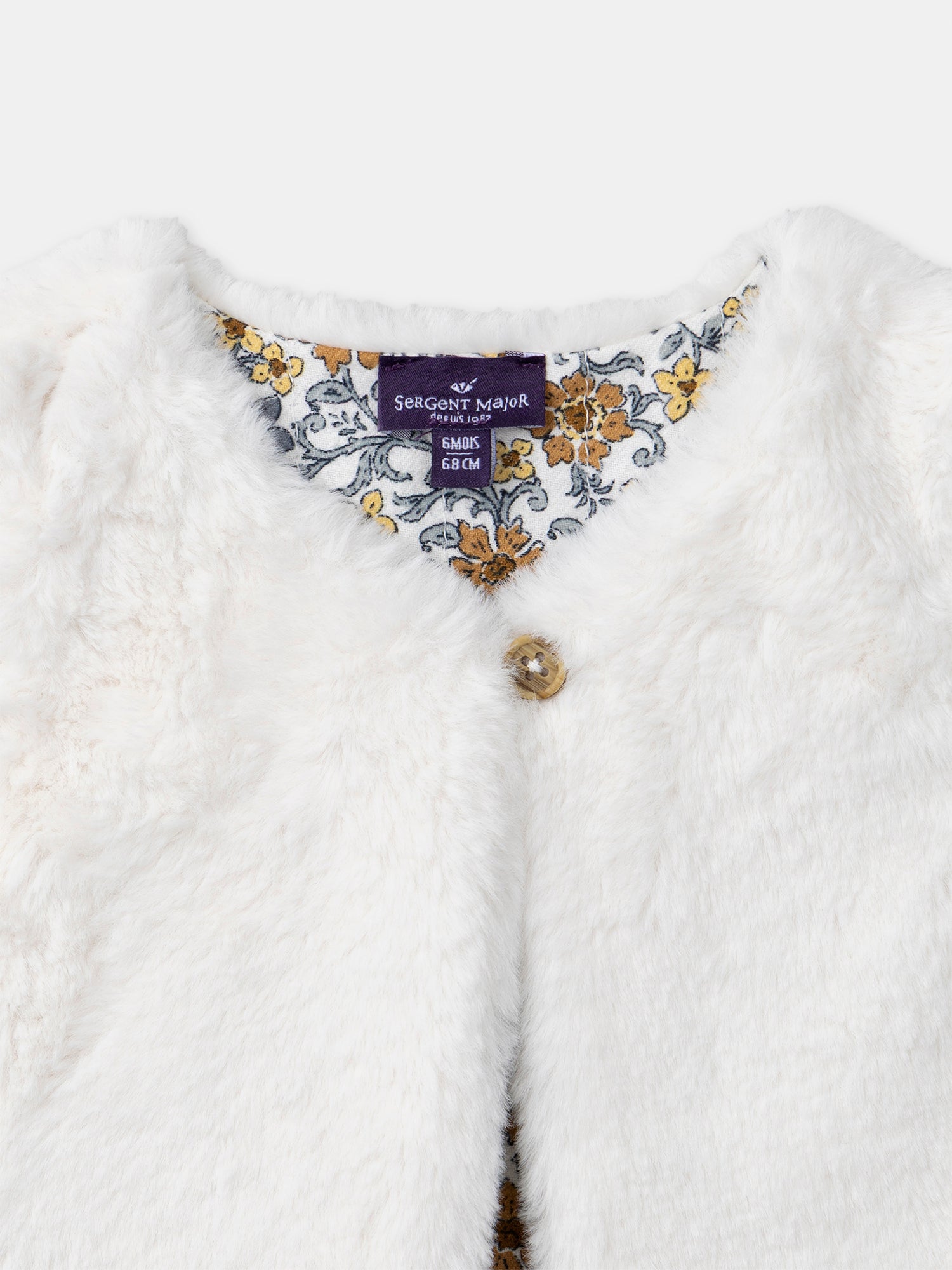 Reversibles weißes Weste aus Fell oder Floralprint für Mädchen