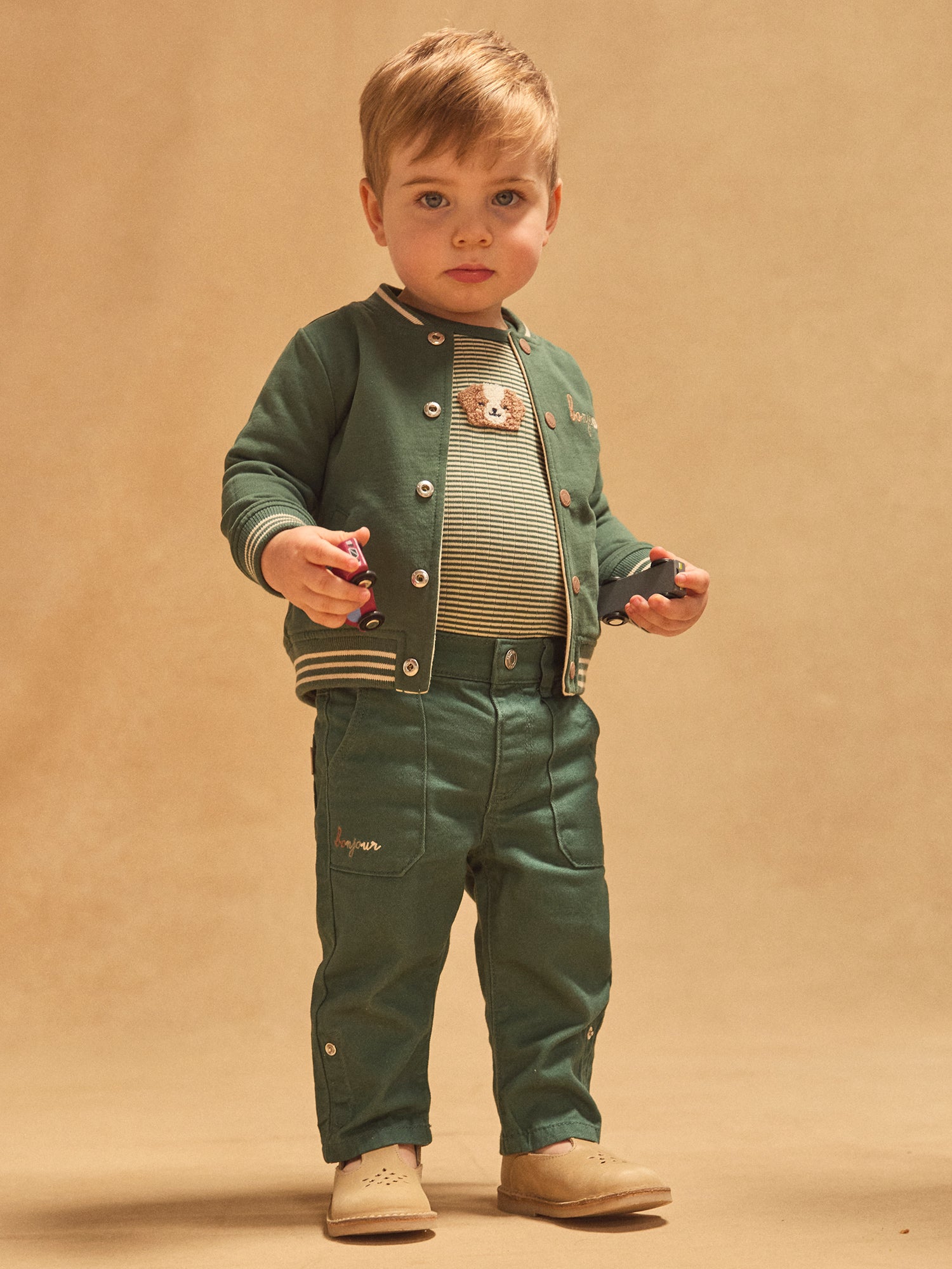 Wendbarer Teddy dunkelgrün einfarbig oder ecru mit Hunden für Baby Jungen