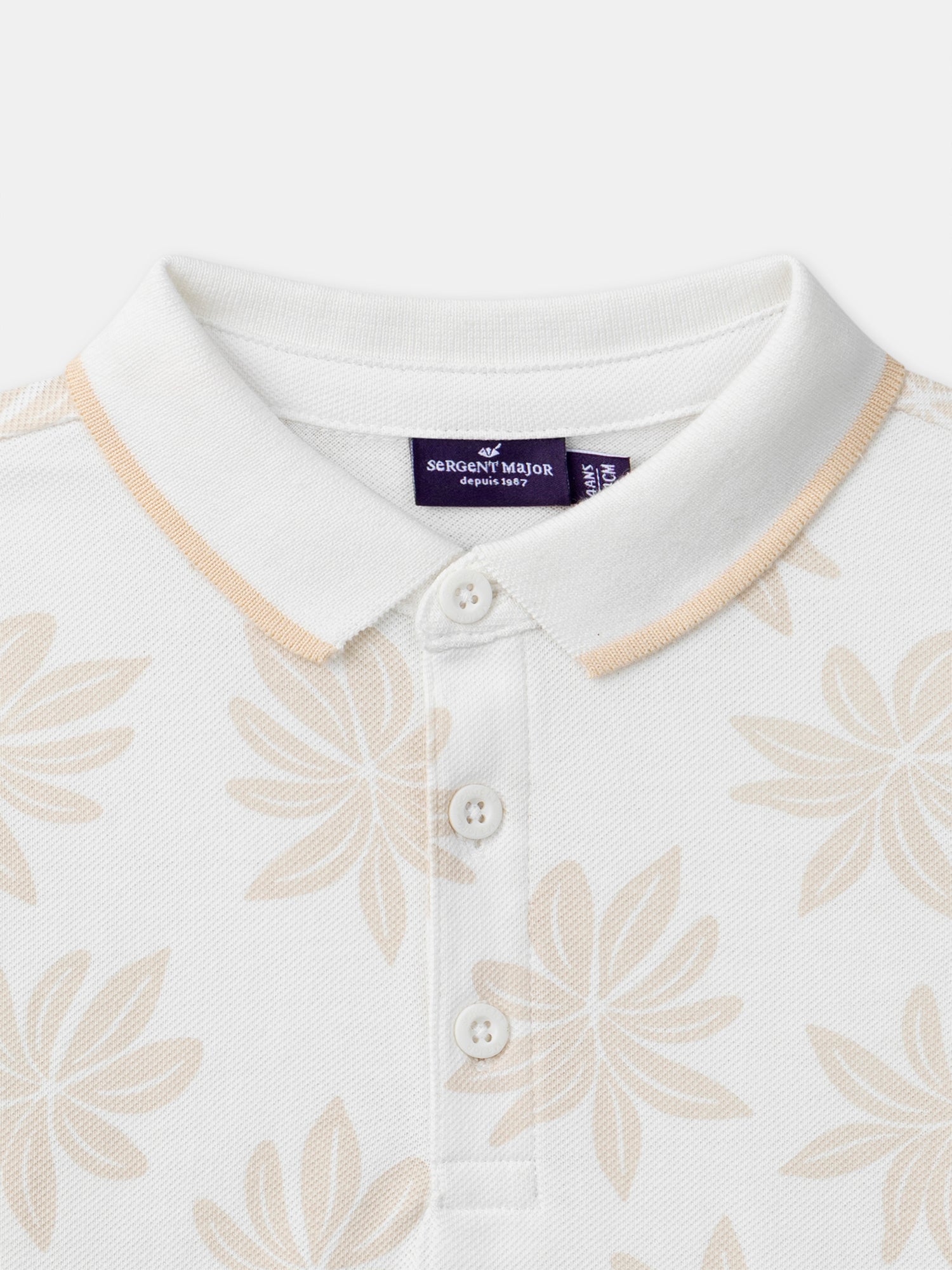 Creme Polo mit Palmbaum-Muster für Jungen