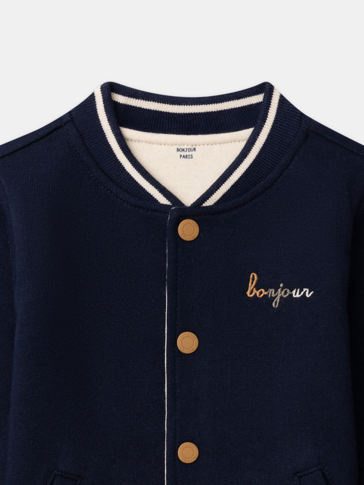 Reversibler Teddy in Marineblau oder Elfenbein mit Hundemuster für Baby Jungen