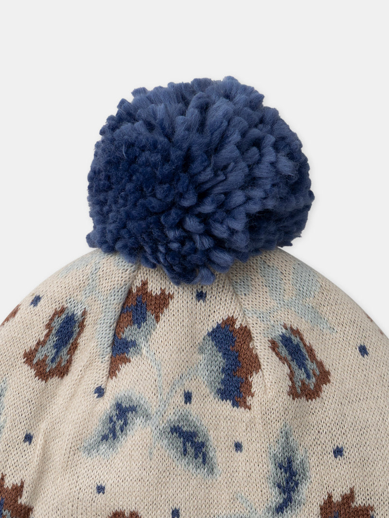 Beige Mütze aus Strick mit Blumenmuster und Pompon für Mädchen
