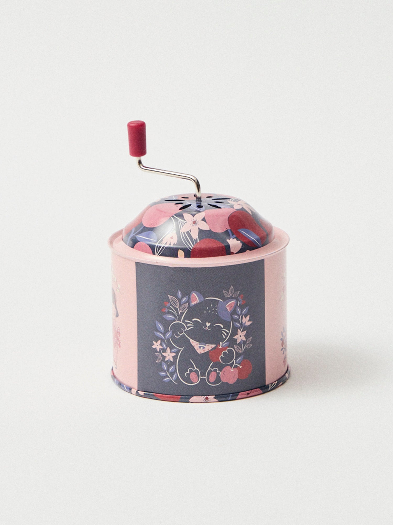 Musikspieluhr in Rosa und Marineblau mit Apfelmotiven