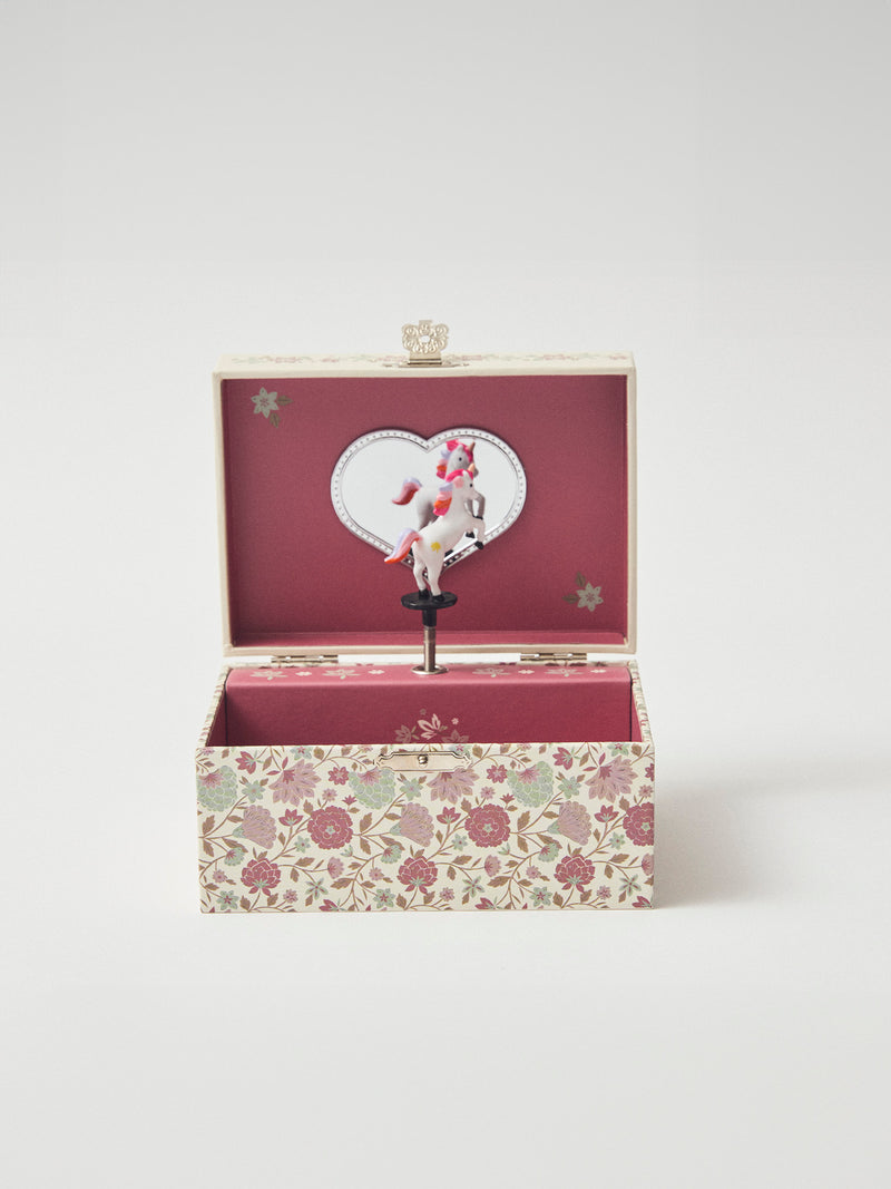 Boîte à musique licorne et imprimé fleuri