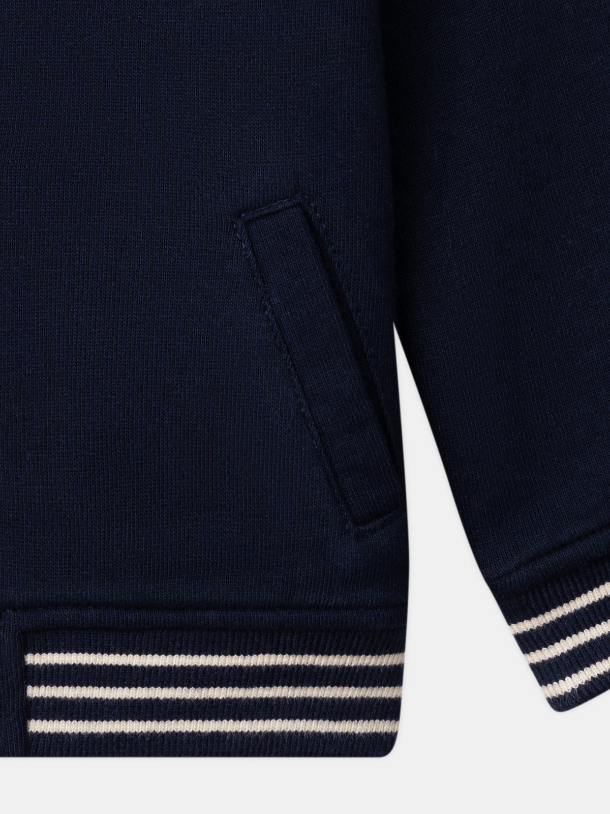 Reversibler Teddy in Marineblau oder Elfenbein mit Hundemuster für Baby Jungen