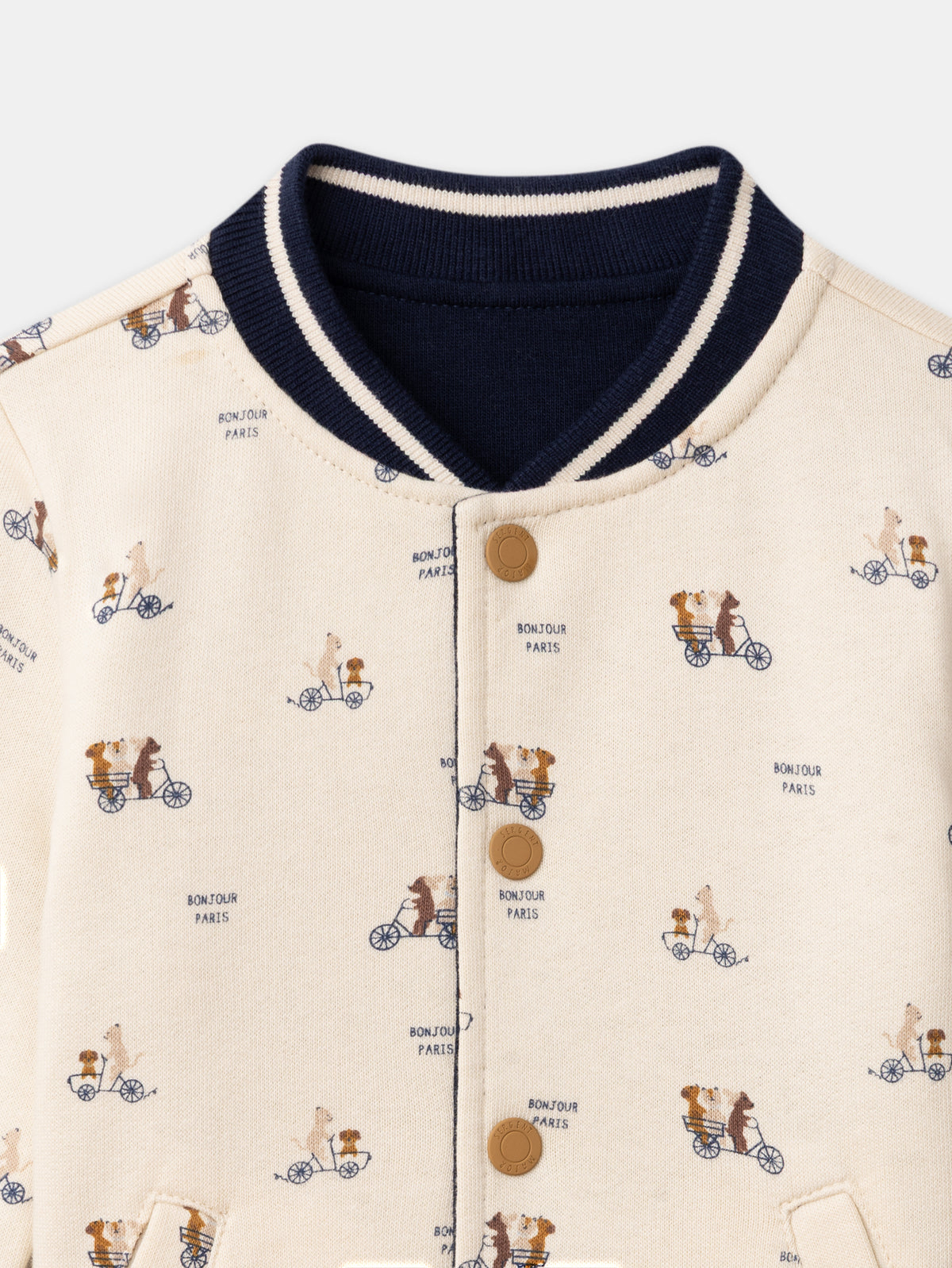 Reversibler Teddy in Marineblau oder Elfenbein mit Hundemuster für Baby Jungen